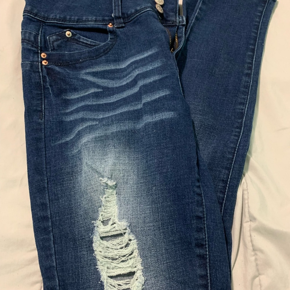 High waisted dark washed ripped jeans!